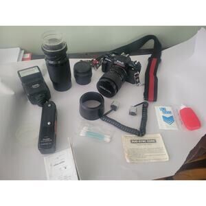 Fuji AX Multi Program Camera, Tamron lenses, smart cord, rewinder, flash.